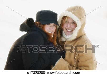 Teenage girls outside in winter View Large Photo Image Stock Photo - Teenage girls outside in winter. Fotosearch