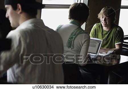 Teenager in discussion with another View Large Photo Image Picture - Teenager in discussion with another. Fotosearch