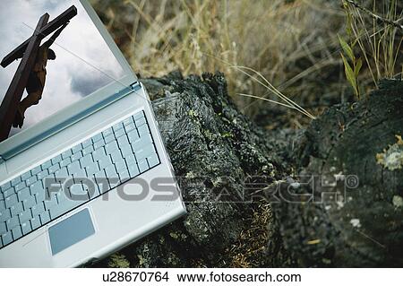 the crucifixion on a lap top computer View Large Photo Image Picture - the crucifixion on a lap top computer. Fotosearch
