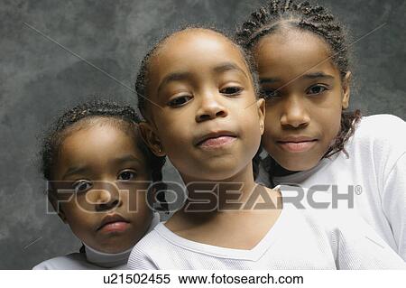 Three young girls View Large Photo Image Stock Photography - Three young girls. Fotosearch