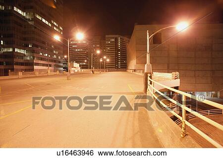 Top level of parkade at night View Large Photo Image Stock Photograph - Top level of parkade at night. Fotosearch