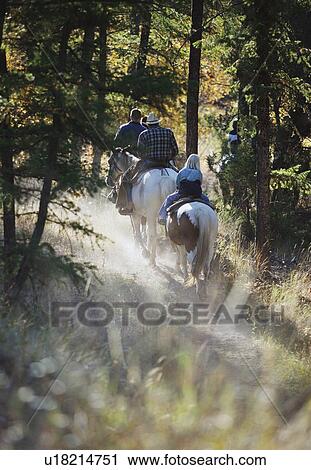 Stock Image - Trail riding. Fotosearch