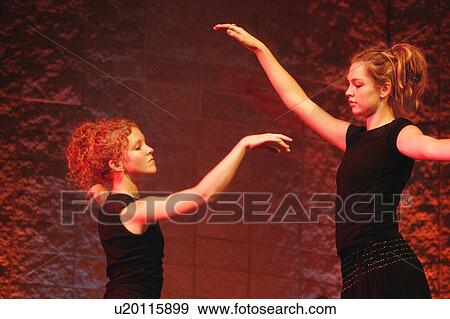 Two girls dancing View Large Photo Image Stock Photo - Two girls dancing. Fotosearch