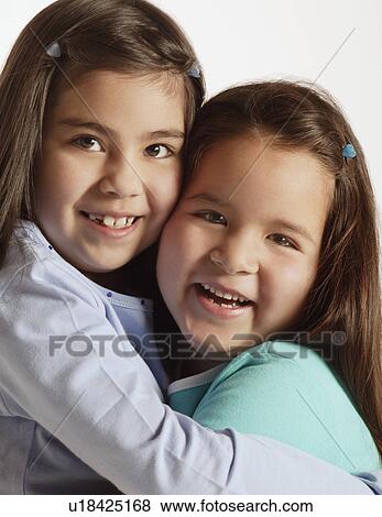 Stock Photo - Two girls together. Fotosearch