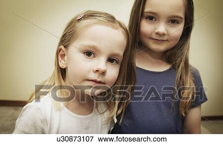 Two little girls View Large Photo Image Stock Photo - Two little girls. Fotosearch
