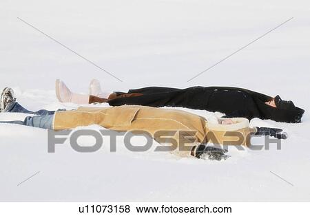 Stock Photo - Two teen girls in snow. Fotosearch