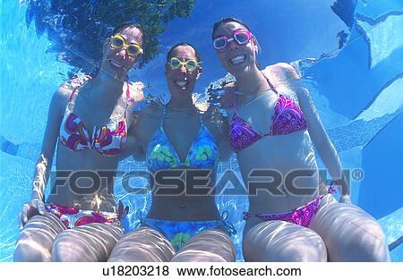 Underwater portrait of three young women View Large Photo Image Stock Photo - Underwater portrait of three young women. Fotosearch