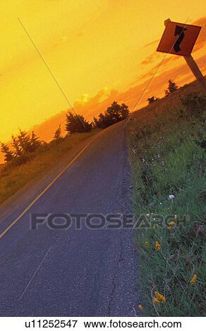 Stock Photo - Winding Road Red Rock Canyon Waterton Lakes National Park Alberta Canada . Fotosearch