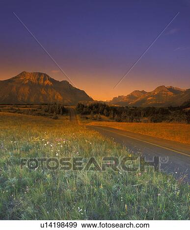 Stock Photo - Winding Road Red Rock Canyon Waterton Lakes National Park Alberta Canada. Fotosearch