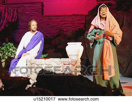 Stock Photo - Woman at the well. Fotosearch