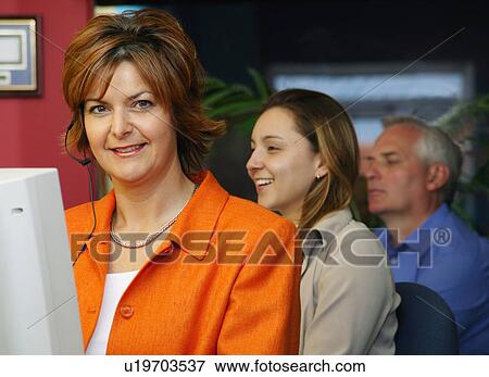 Stock Photo - Woman at work. Fotosearch