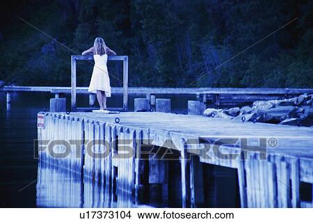 Woman finds a quiet place View Large Photo Image Picture - Woman finds a quiet place. Fotosearch