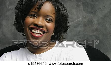 Stock Image - Woman laughing. Fotosearch