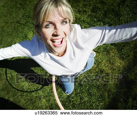 Woman plays with hoop View Large Photo Image Stock Photography - Woman plays with hoop. Fotosearch