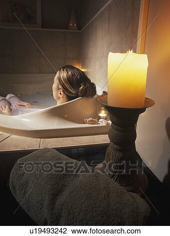 Woman relaxing in hot tub View Large Photo Image Stock Image - Woman relaxing in hot tub. Fotosearch