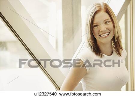 Stock Image - Woman smiles. Fotosearch