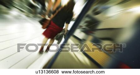Stock Photo - Woman walking away. Fotosearch