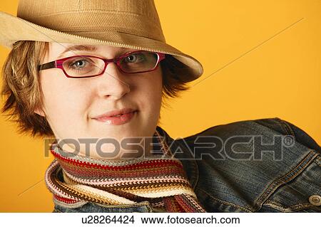 Woman with a hat View Large Photo Image Picture - Woman with a hat. Fotosearch