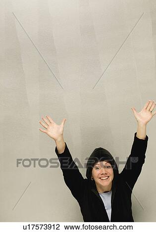 Woman with hands in the air View Large Photo Image Stock Image - Woman with hands in the air. Fotosearch