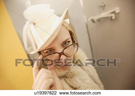 Woman with large glasses View Large Photo Image Stock Image - Woman with large glasses. Fotosearch