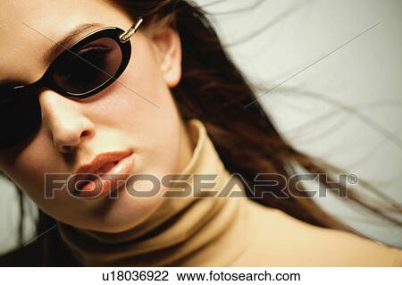 Woman with sunglasses View Large Photo Image Stock Image - Woman with sunglasses. Fotosearch