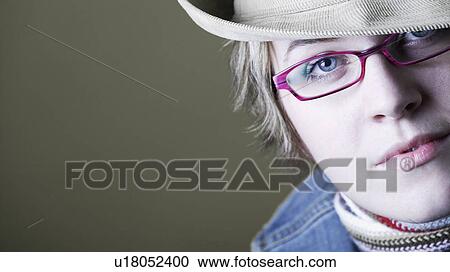 Woman with trendy glasses View Large Photo Image Stock Image - Woman with trendy glasses. Fotosearch