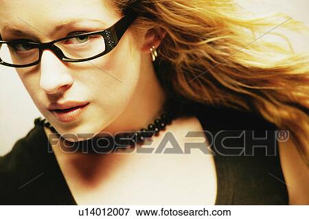 Stock Photo - Woman with trendy glasses. Fotosearch