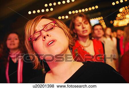 Woman worshipping the Lord View Large Photo Image Stock Photo - Woman worshipping the Lord. Fotosearch