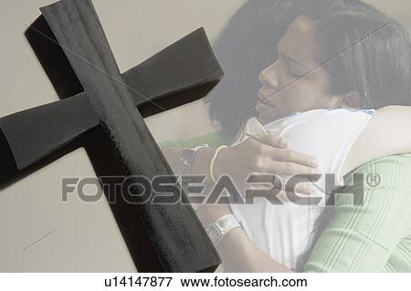 Women hugging, cross View Large Photo Image Stock Photo - Women hugging, cross. Fotosearch