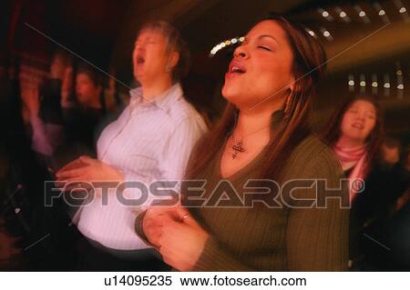 Women worshipping View Large Photo Image Stock Photography - Women worshipping. Fotosearch