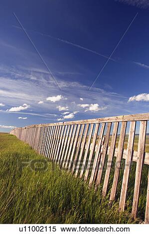 Wooden boundary fence in Southern Alberta Canada View Large Photo Image Stock Photography - Wooden boundary fence in Southern Alberta Canada. Fotosearch