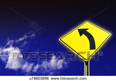 Yellow left turn sign View Large Photo Image Stock Photograph - Yellow left turn sign. Fotosearch