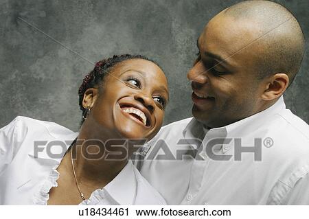 Young couple hugging View Large Photo Image Stock Image - Young couple hugging. Fotosearch