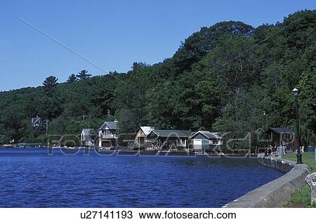 A body of water with cottages lining it View Large Photo Image Stock Image - A body of water with cottages lining it. Fotosearch