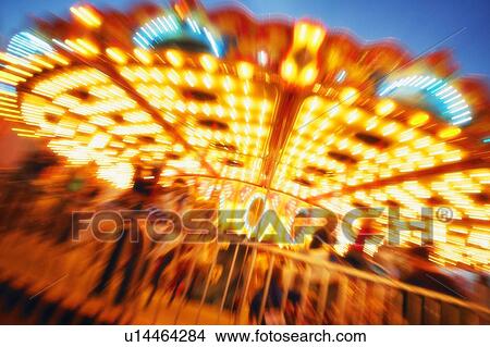Picture - A carousel ride. Fotosearch