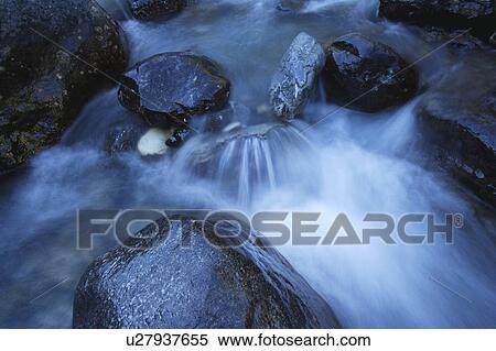 A close-up (close up closeup) of white water in a stream View Large Photo Image Stock Photography - A close-up (close up closeup) of white water in a stream. Fotosearch