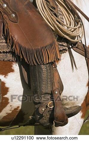 Stock Image - A close-up of a roper on horseback. Fotosearch