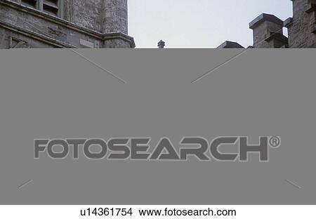 A cross on top of a building View Large Photo Image Picture - A cross on top of a building. Fotosearch