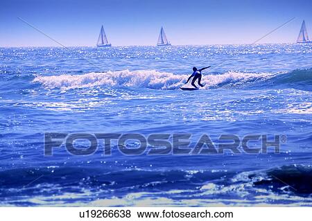 Stock Photo - A good day for surfing. Fotosearch