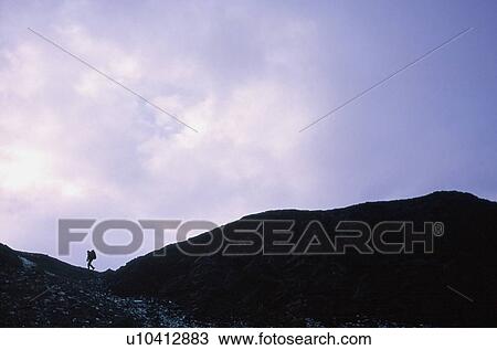 A hiker's silhouette View Large Photo Image Stock Image - A hiker's silhouette. Fotosearch