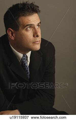 Stock Photo - A portrait of a business man. Fotosearch
