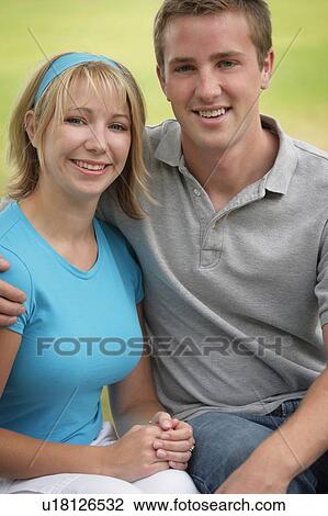 Stock Image - A portrait of a young couple. Fotosearch
