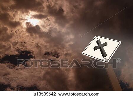 A road sign with a cross against a cloudy sky View Large Photo Image Stock Image - A road sign with a cross against a cloudy sky. Fotosearch
