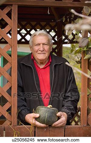 A senior with a squash View Large Photo Image Stock Photography - A senior with a squash. Fotosearch