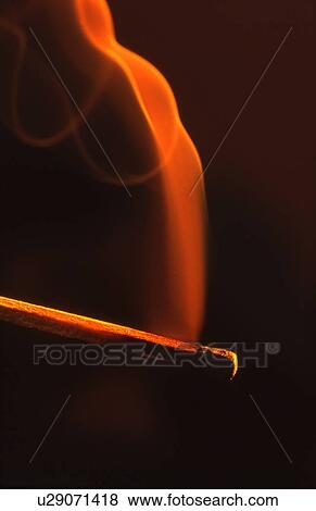 A smoldering match View Large Photo Image Stock Photo - A smoldering match. Fotosearch