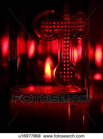 Stock Photo - Candle in glass holder. Fotosearch