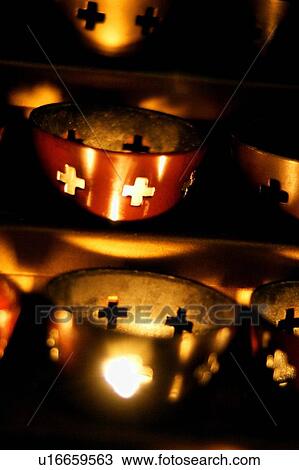 Candles burning in a church View Large Photo Image Stock Image - Candles burning in a church. Fotosearch
