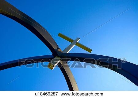 Stock Photo - Cross suspended in arches. Fotosearch
