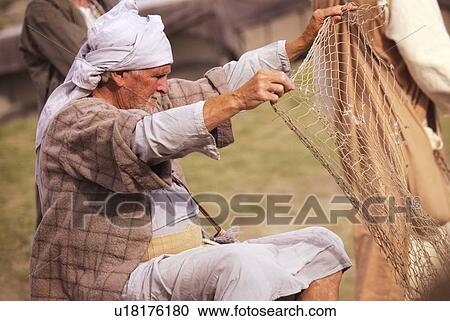 Fisherman and net View Large Photo Image Stock Image - Fisherman and net. Fotosearch