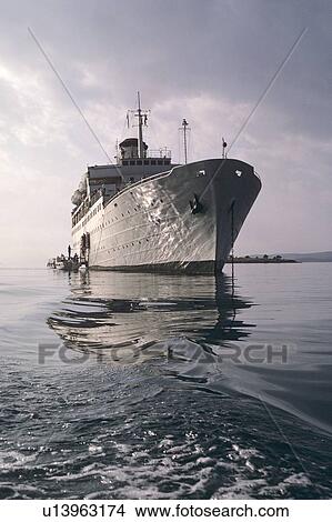 Picture - Holiday Cruise Liner disembarking at Delphi. Fotosearch